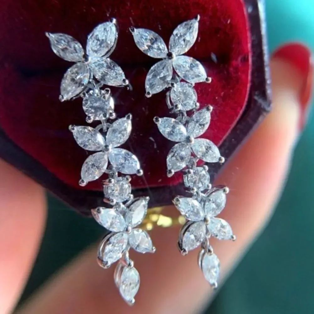 Victoria cubic zirconia flower dangle earrings ￼
